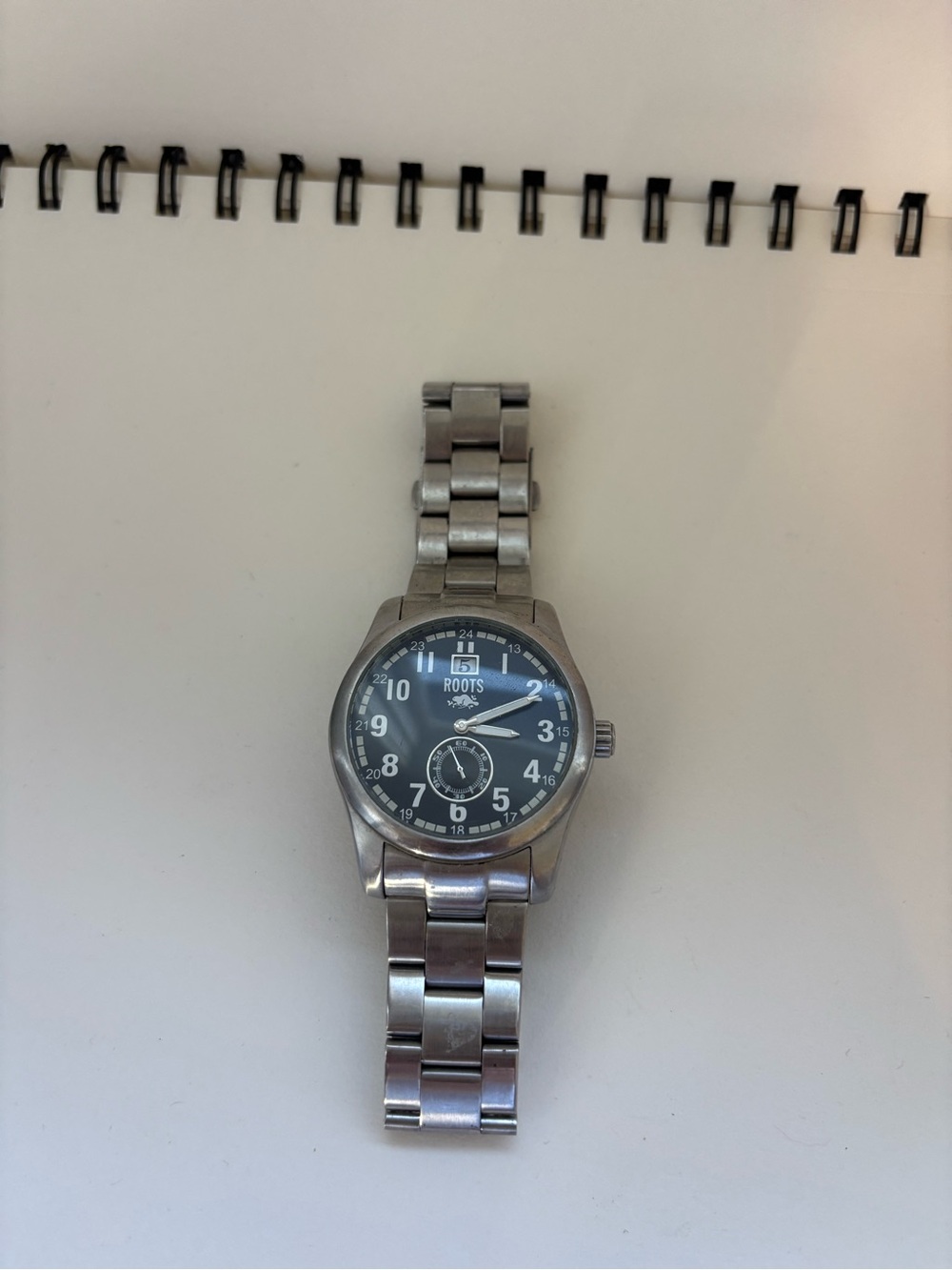 2000s Roots Men's Silver Stainless Steel Watch with Black Dial
